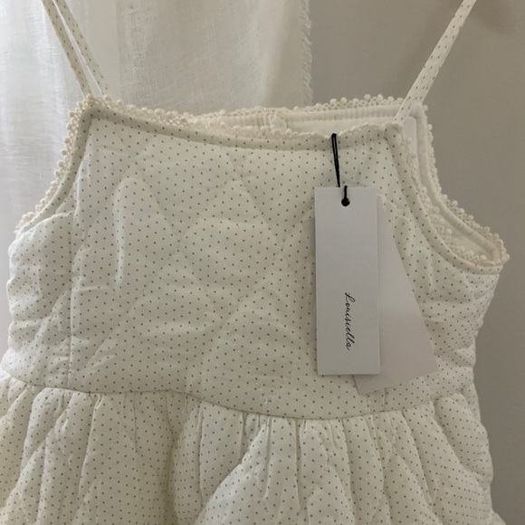 Dafne Quilted Dress
VENDOR
LOUISIELLA - Picture 5 of 5